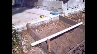 On building a small concrete ramp onto an old house foundation.