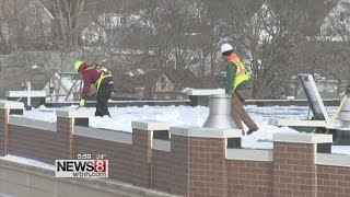 Snow removal can prevent roof collapse