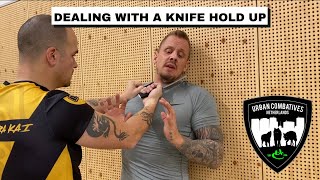 DEALING WITH A KNIFE HOLD UP