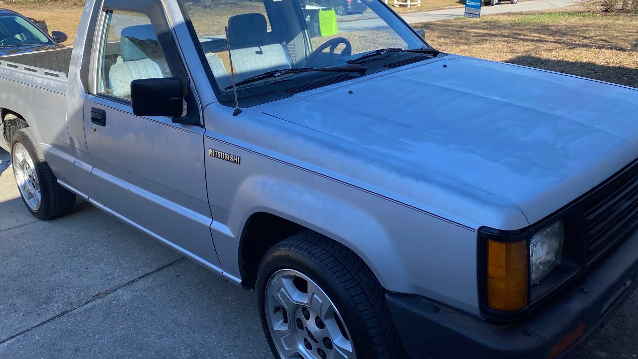 How to remove radio/heater control cover on 1987 mighty max YouTube