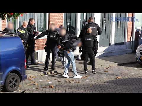 Politie-inval in woning na vuurwapenmelding, Rotterdamsedijk Schiedam