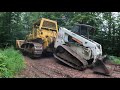 Dragging a broken Bobcat with a dozer