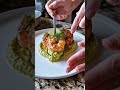 Creamy avocado shrimp cups topped with juicy seasoned shrimp and fresh lime