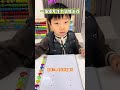 Mom takes her baby at home and plays with them to focus and exercise hand-eye coordination and h