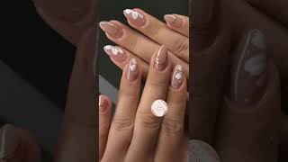 🌸 Blooming beauty at your fingertips! 🌸Delicate flower nail art that adds elegance