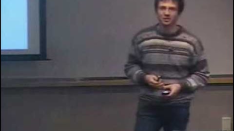 Local chromatic number of quadrangulation of surfaces