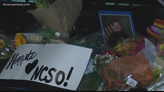 Accused killer captured; memorial grows for slain Nassau County deputy