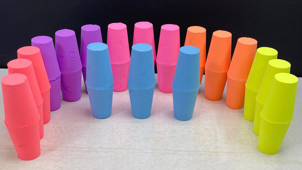 Crushing rainbow cups made of baking soda