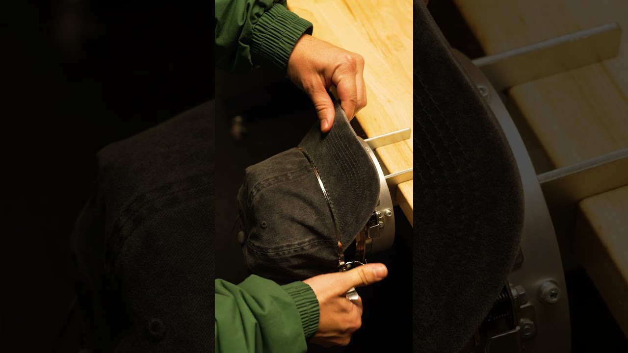 Embroidering a Martini design on dad hat using Tajima TMBP-2 