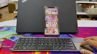 Review keyword OEM B033 Portable Foldable Mini BT Wireless Keyboard with Touch Pad