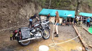 Royal Enfiled Bike wash by a foreigner