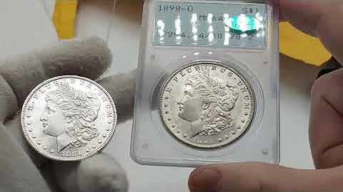 I paid $185 for a Morgan silver dollar sealed in old plastic with a green sticker on it?