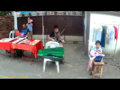 Bangkok Young violinist and unenthused sister