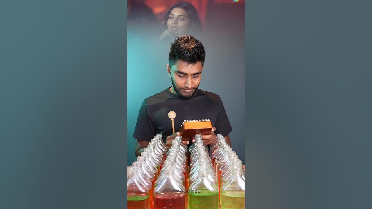 Muththa Mazhai - Bottle & Kalimba Cover Muththa Mazhai - Bottle & Kalimba Cover