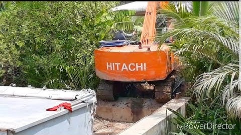 XE CUỐC MÚC ĐẤT XUỐNG PHÀ cần cẩu xáng cạp