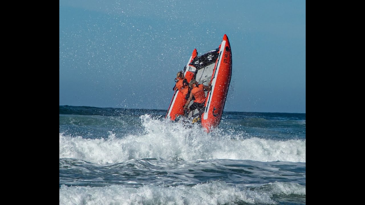 Drone films Couple Surfing Big Waves on Inflatable Boat