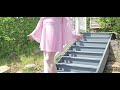 I model pink shiny garterbelt stockings with workwear fashion dress