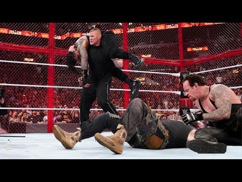 omg the undertaker returns chokeslam braun strowman roman