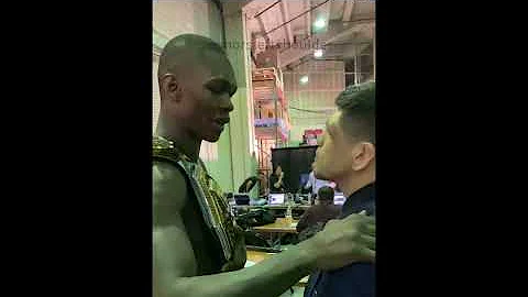 Israel Adesanya and Brandon Moreno backstage after UFC 263