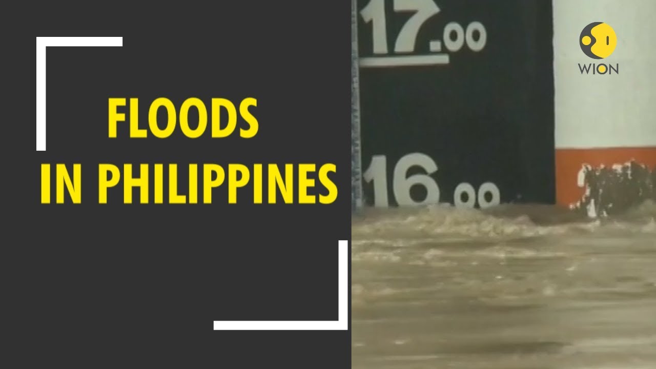 2 dead as flooding in Philippines brings Manila to a standstill
