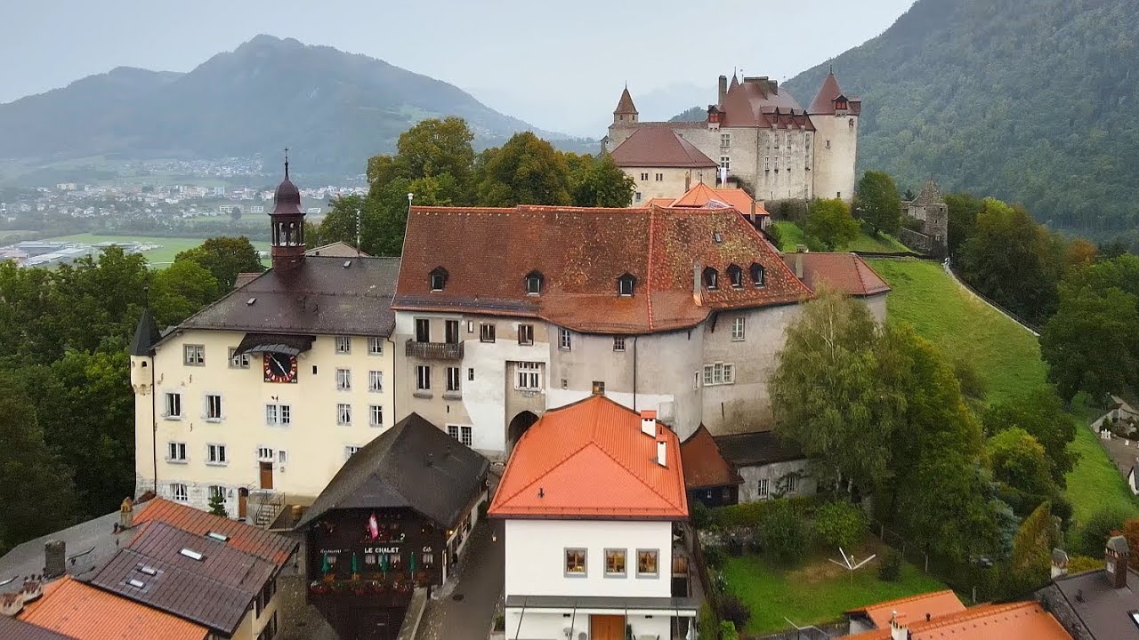 4K Bird's view of Gruyères and its Gruyères Castle, Canton Friborg, Switzerland