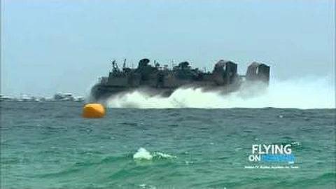 US Navy LCAC Hovercraft Land on Beach, Unload Equipment, Return to Aircraft Carrier