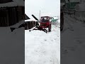 Т16 с отвалом чистит снег