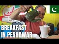 BREAKFAST IN PESHAWAR / TRYING LOCAL VERSION OF PARATHA WITH CHANA AND EGGS / PAKISTAN FOOD VLOG