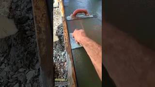 Smoothing Fresh Concrete Surface Using a Hand Trowel