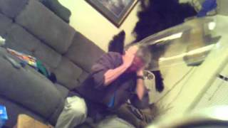 Pat blowing up a condom with his head & nose.