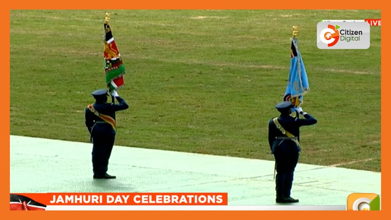 Wajir Airbase airmen troop their colours at Uhuru Gardens during 61st Jamhuri Day celebrations