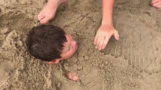 Kid Gets Buried In Sand At Rehoboth Beach