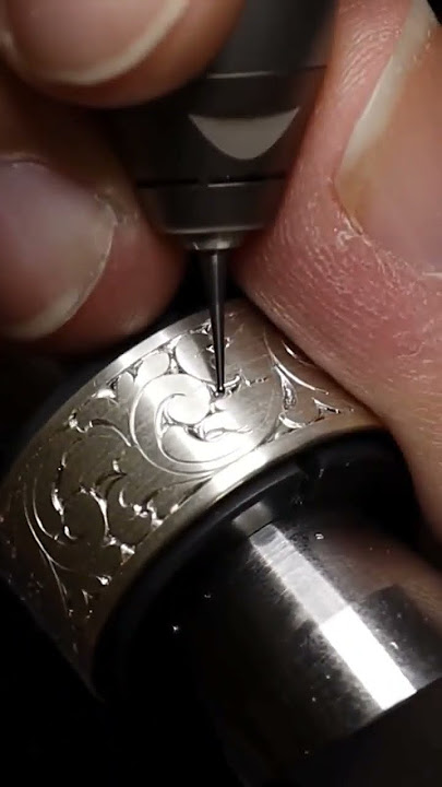 Background removal using a micro rotary burr. #handengraving #customengraving #scroll #jeweler