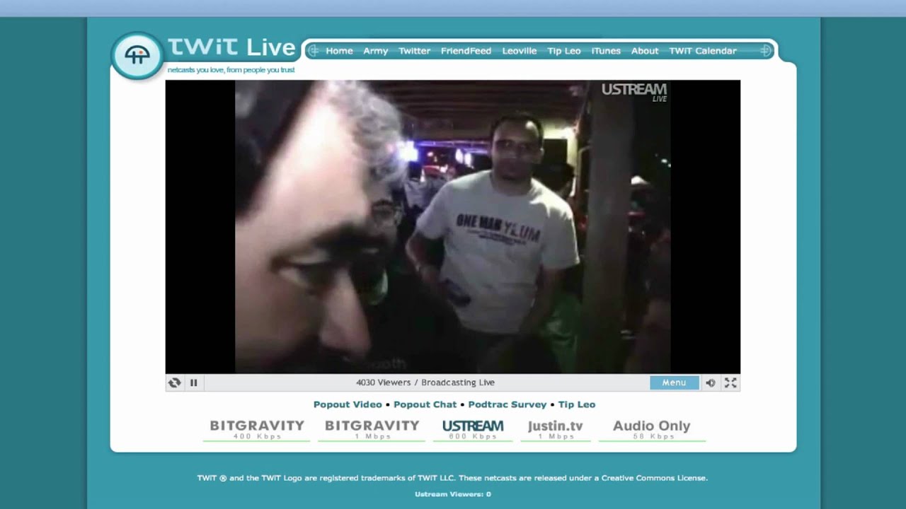 Roberto from Throwboy gives a TWiT pillow to Leo Laporte at SXSW '10!