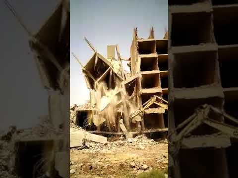 إزالة العقارات المخالفة بشارع الاخلاص بالطالبية من خلال حي الطالبية