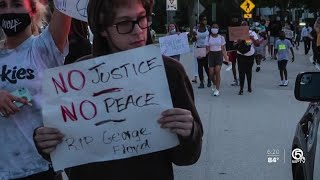 A palm beach county photojournalist is sharing experience through the
eye of his camera lens after attending protest in honor man killed
police cus...
