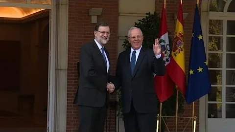 Spanish PM Rajoy greets Peruvian President Kuczyns...