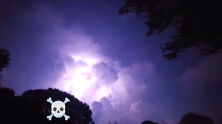 Lightning Bolts And Bright Flashes In Massive Storm Cloud