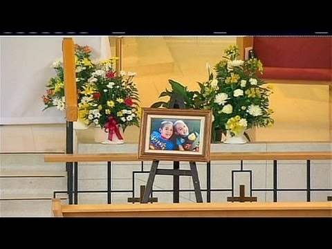 Funeral for brothers killed by snake