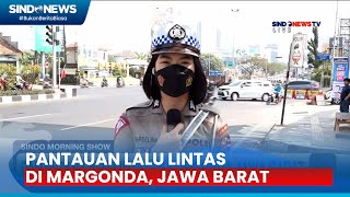 Pantauan Arus Lalu Lintas di Margonda, Jawa Barat oleh Brigadir Marselina Oktavianti