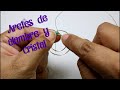 Cómo hacer aretes de alambre y cristal... Aprende a hacer aretes de círculo con alambre y cristal.