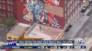 Trial set to begin after bricks fell on downtown West Palm Beach law office