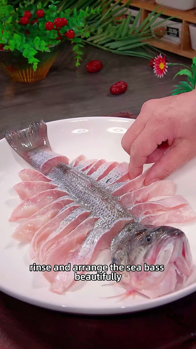 Steamed sea bass is a classic Chinese dish.  #recipe #foodtutorial #fish