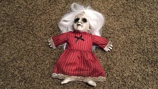 Red Rosie Haunted Doll