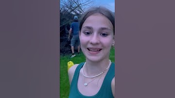 Lighting a bonfire with a flaming arrow.