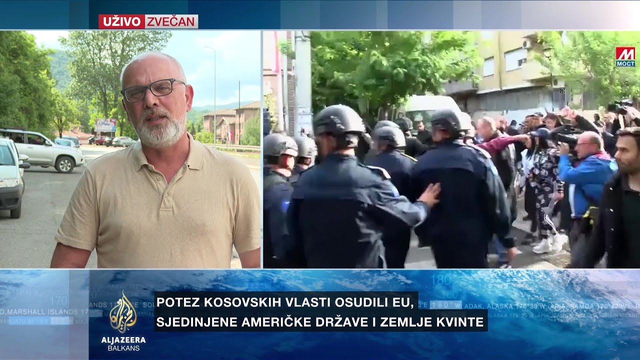 تقف قوات حفظ السلام في كوسوفو (KFOR) بين مواطني زفيتشان وشرطة كوسوفو.