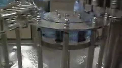 Dây chuyền chiết rót chai 3 trong 1 , máy chiết rót nước tinh khiết, nước trái cây 3 trong1