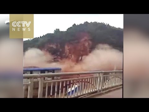 Footage: Landslide destroys building in southeast China