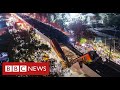 At least 24 dead after train plunges onto busy road in Mexico City - BBC News
