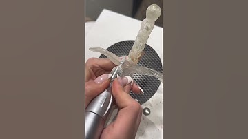 Artist is creating a decorative dagger from epoxy resin and gel!